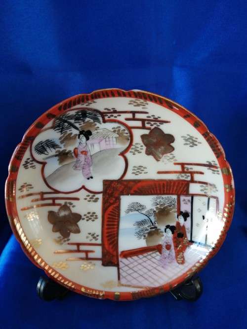 Five mixed china saucers plates and bowls