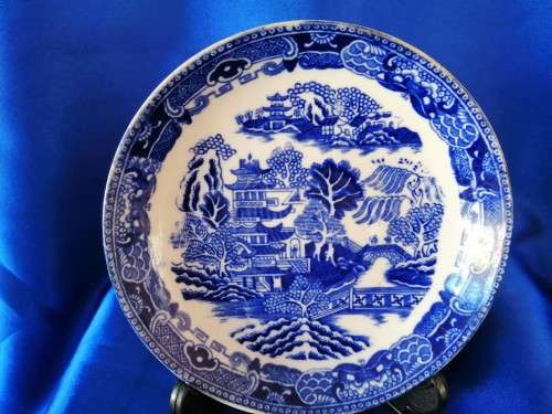 Five mixed china saucers plates and bowls