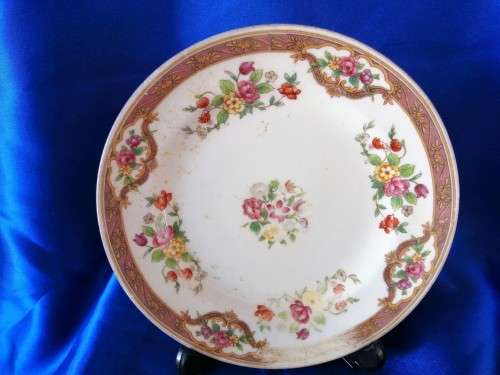 Five mixed china saucers plates and bowls