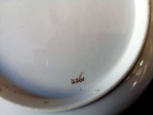 Five mixed china saucers plates and bowls