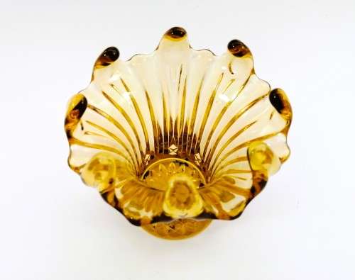 Amber glass vase has a unusual shape