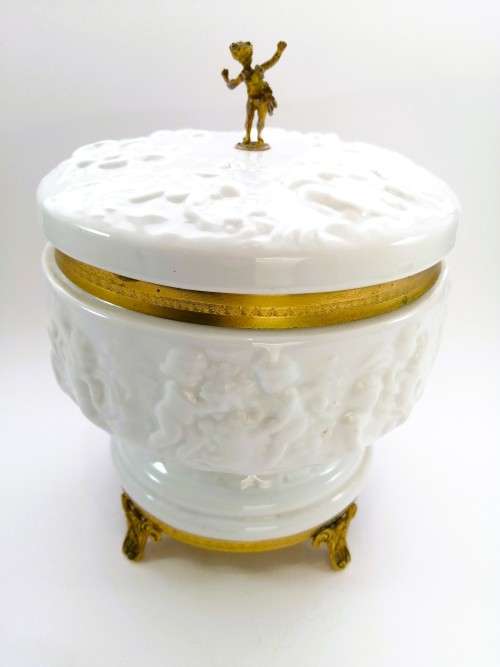 Continental blanc de Chine gilt metal mounted bowl depicting putti Cherubs