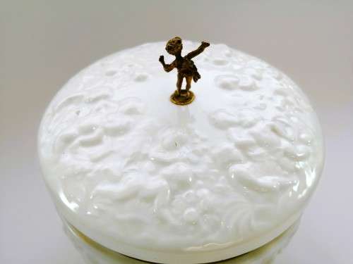 Continental blanc de Chine gilt metal mounted bowl depicting putti Cherubs