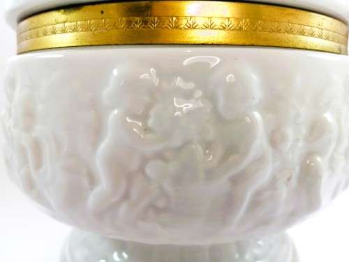 Continental blanc de Chine gilt metal mounted bowl depicting putti Cherubs