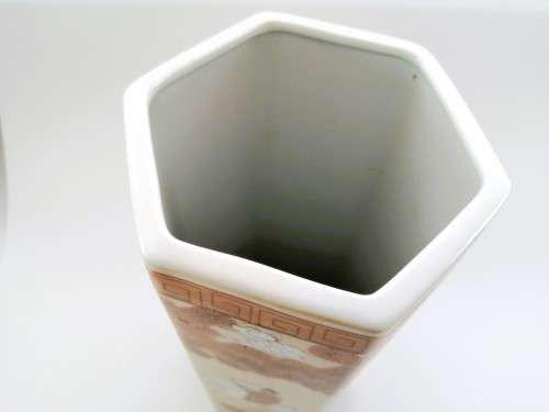 Japanese Tall hexagonal vase decorated with figures