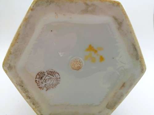 Japanese Tall hexagonal vase decorated with figures