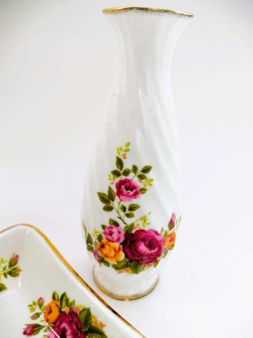Fine Bone China Cottage Rose set of 4 items with gold trim.
