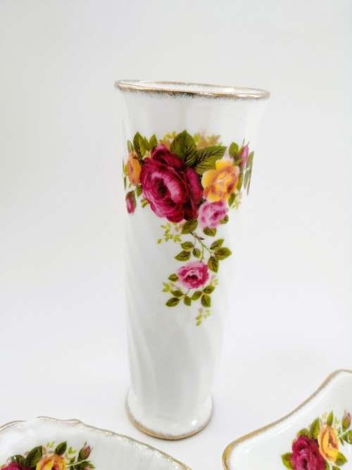 Fine Bone China Cottage Rose set of 4 items with gold trim.