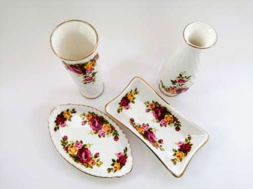 Fine Bone China Cottage Rose set of 4 items with gold trim.