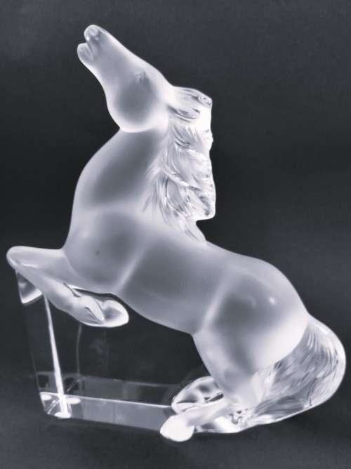 Pair of Lalique clear and frosted crystal Kazak rearing horse bookends designed by Marie-Claude