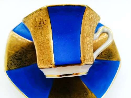 ALKA KUNST KRONACH BAVARIA GERMANY 1950S BLUE AND GOLD DEMITASSE TEACUP AND SAUCER