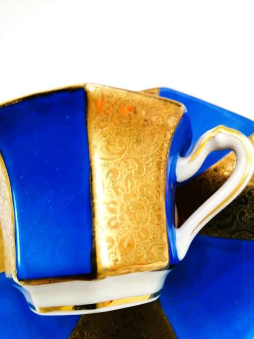 ALKA KUNST KRONACH BAVARIA GERMANY 1950S BLUE AND GOLD DEMITASSE TEACUP AND SAUCER