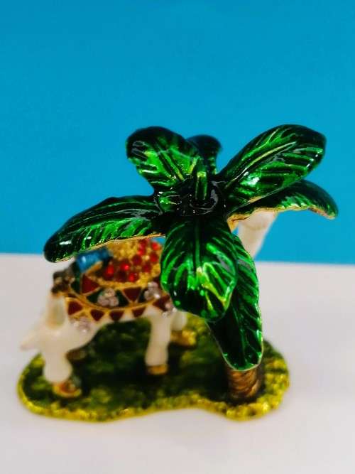 WONDERFUL ARABIC TRINKET BOX OF A ENAMELED JEWELED CAMEL AND PALM TREE