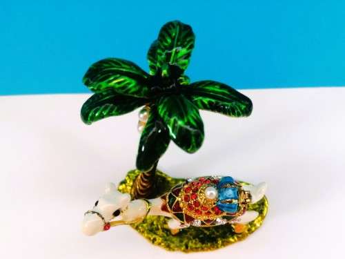 WONDERFUL ARABIC TRINKET BOX OF A ENAMELED JEWELED CAMEL AND PALM TREE