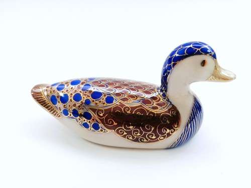 Two Vintage gold trim ceramic ducks