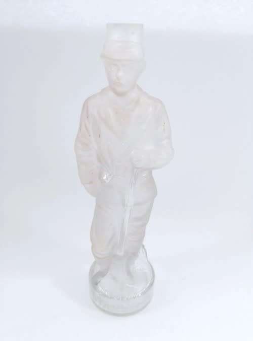 French clear and frosted glass military figurine bottle inscribed STANLEY, circa 1900