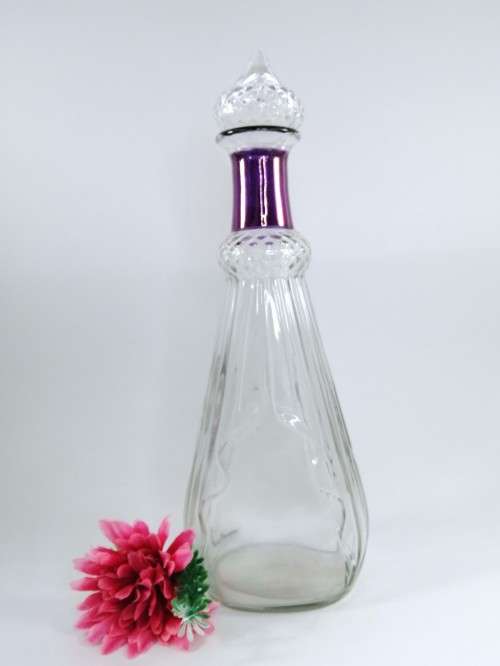 PROHIBITION ERA (1935-1964) CLEAR CUT GLASS GENIE DECANTER WITH PURPLE RING NECK
