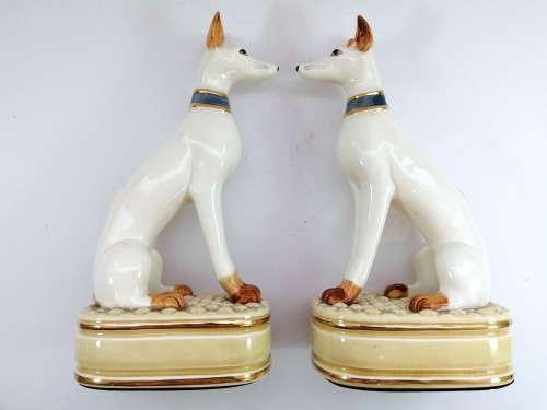 Pair of porcelain tall greyhound statues
