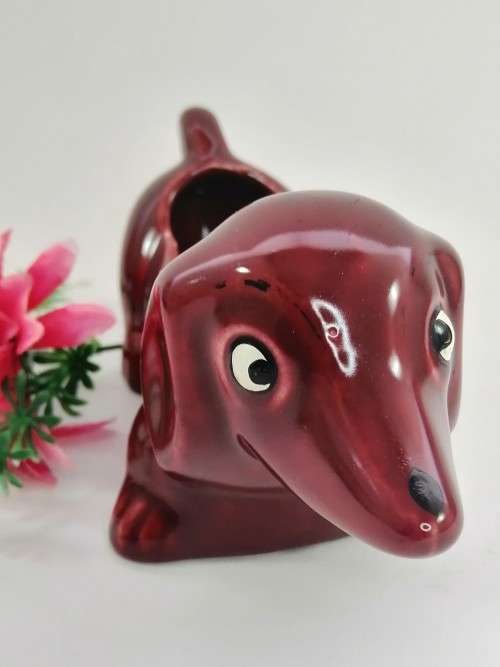 Very cute vintage burgundy Dachshund Sausage Dog holder