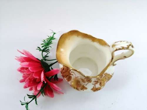 Hand painted milk jug made by Crescent England