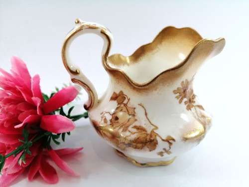 Hand painted milk jug made by Crescent England