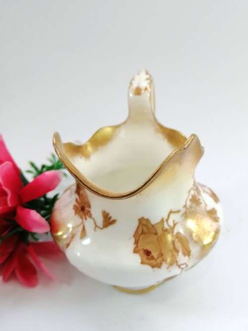 Hand painted milk jug made by Crescent England