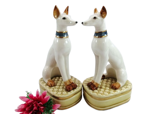 Pair of porcelain tall greyhound statues