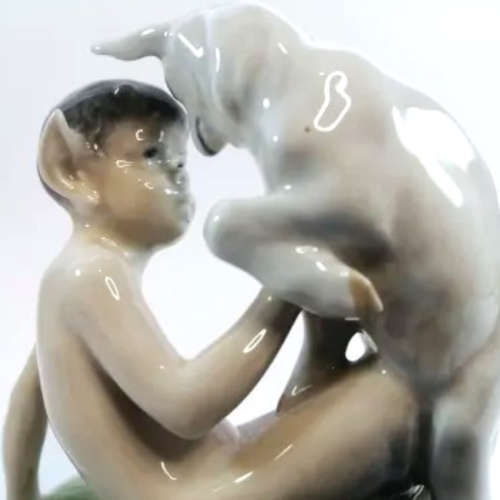 Royal Copenhagen Figurine Of A Faun Playing With A Goat, Model No. 498