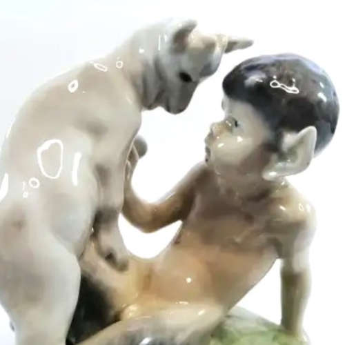 Royal Copenhagen Figurine Of A Faun Playing With A Goat, Model No. 498