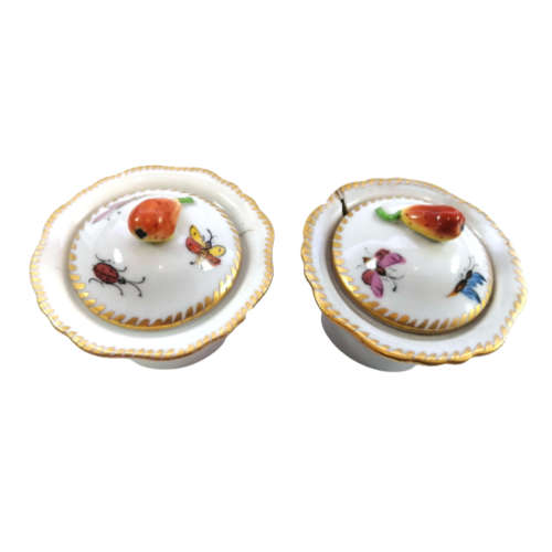 Antique lidded pots showcase charming motifs, including ladybird and butterflies