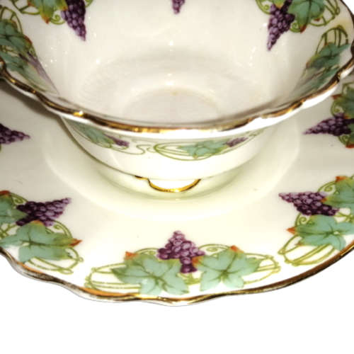 Royal Doulton Trio featuring a charming purple grapes and green vines with  gold accents.