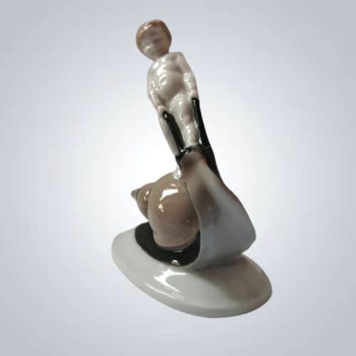 Rosenthal Figurine Selb- Bavaria Figurine of Boy Riding a Snail.