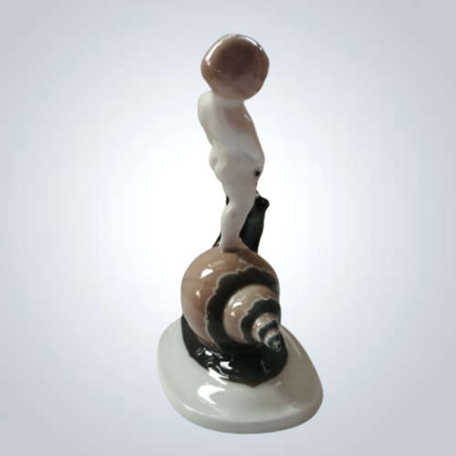 Rosenthal Figurine Selb- Bavaria Figurine of Boy Riding a Snail.