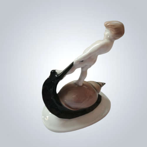 Rosenthal Figurine Selb- Bavaria Figurine of Boy Riding a Snail.