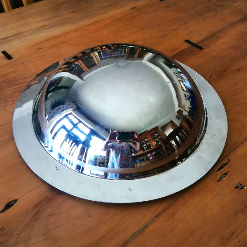 Carrol Boyes Eye-catching Stainless Steel Fruit Bowl has Sculptural figure-like fixtures on the rim