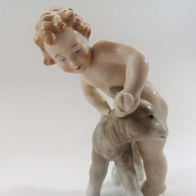 West German Alka Kunst Figurine Depicting a Putto with Lamb