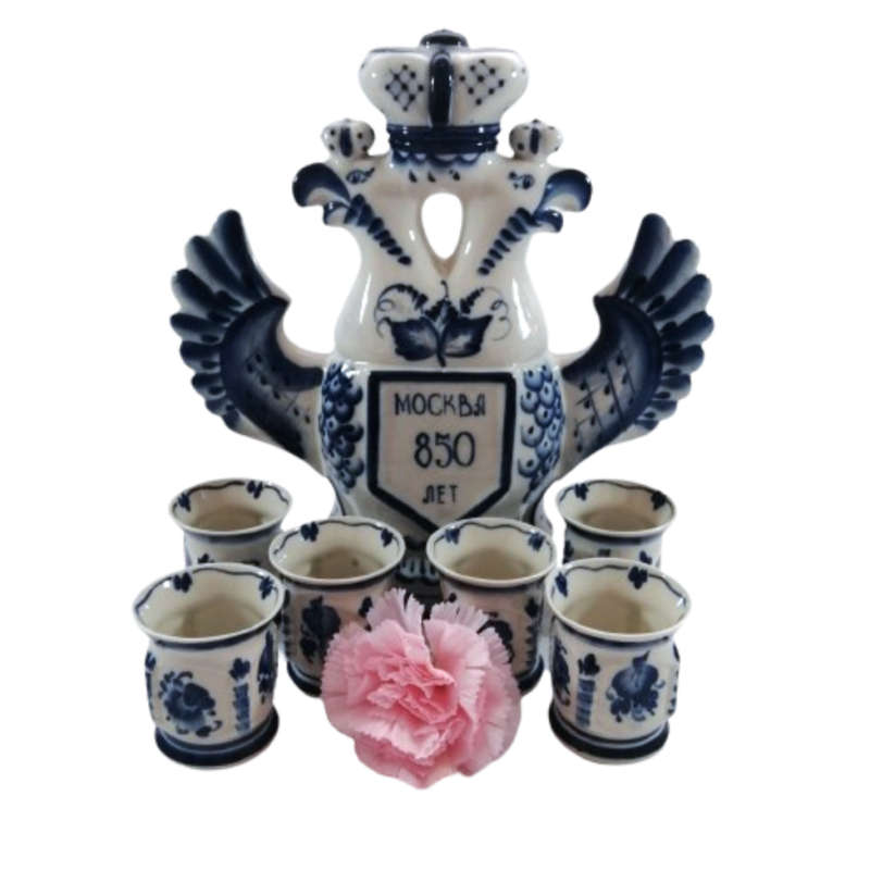 A Russian pottery flask in the form of the Imperial Eagle with blue and white decoration