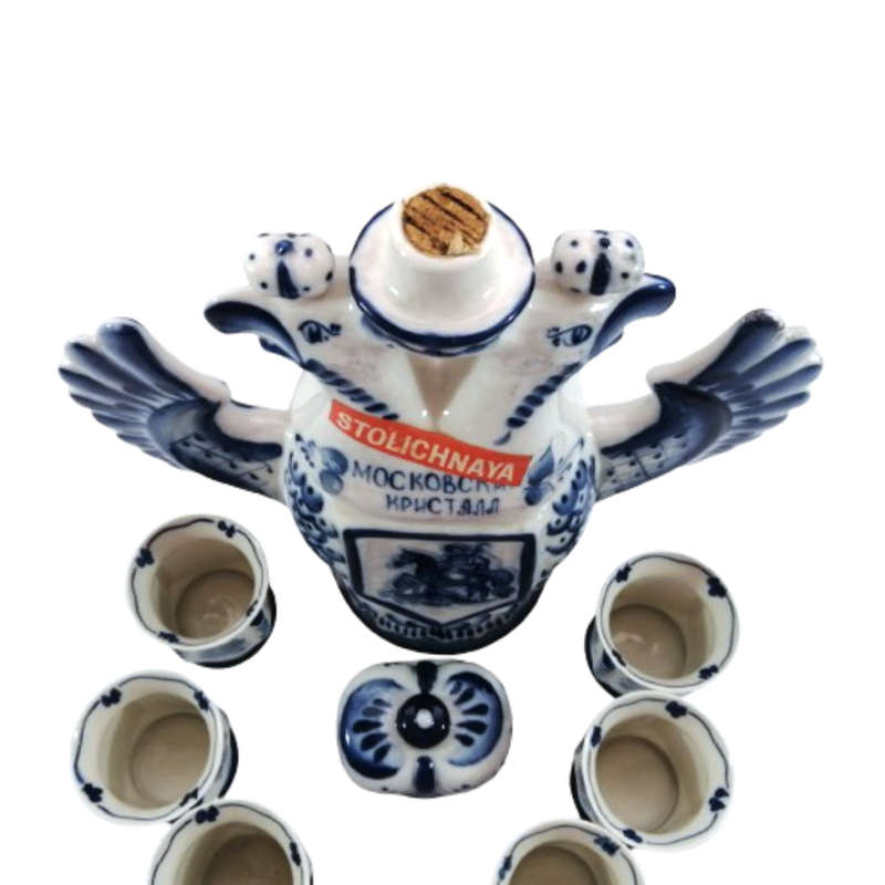 A Russian pottery flask in the form of the Imperial Eagle with blue and white decoration