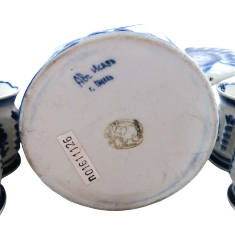 A Russian pottery flask in the form of the Imperial Eagle with blue and white decoration