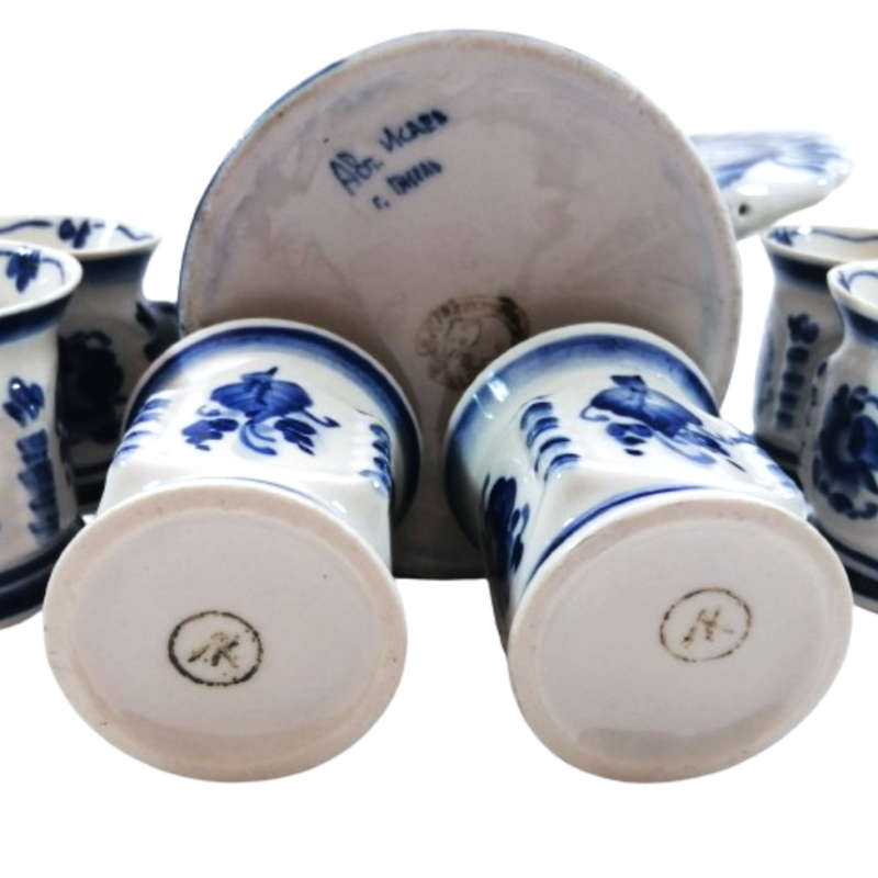A Russian pottery flask in the form of the Imperial Eagle with blue and white decoration