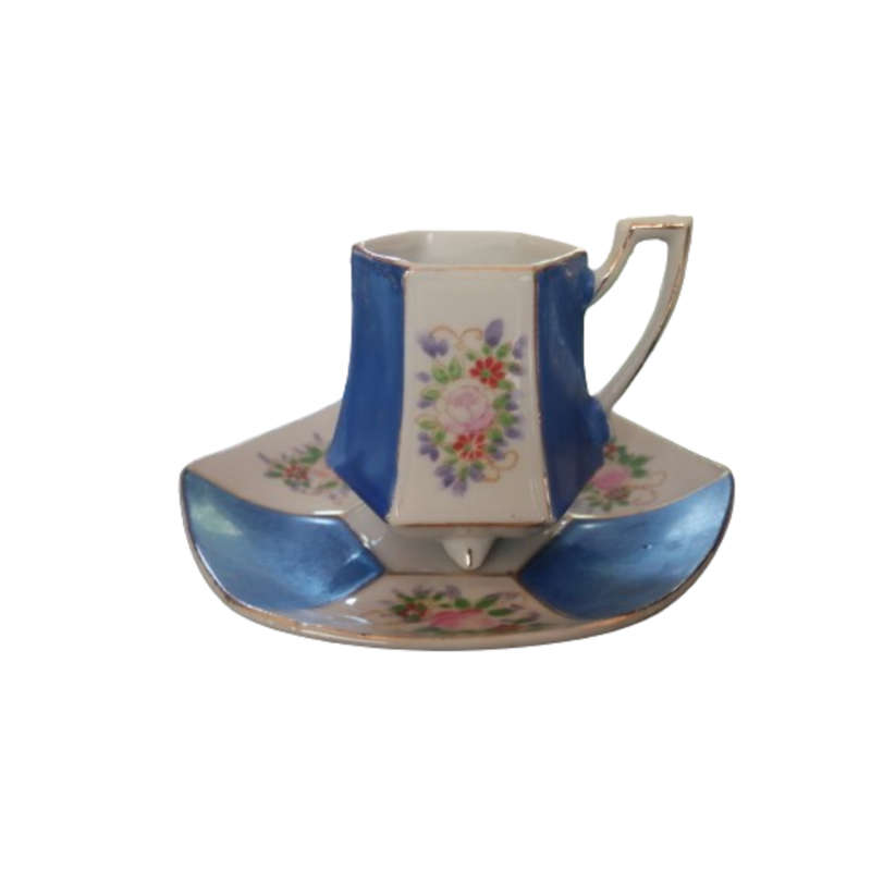 Vintage Japanese  hand painted miniature tea cup and saucer set