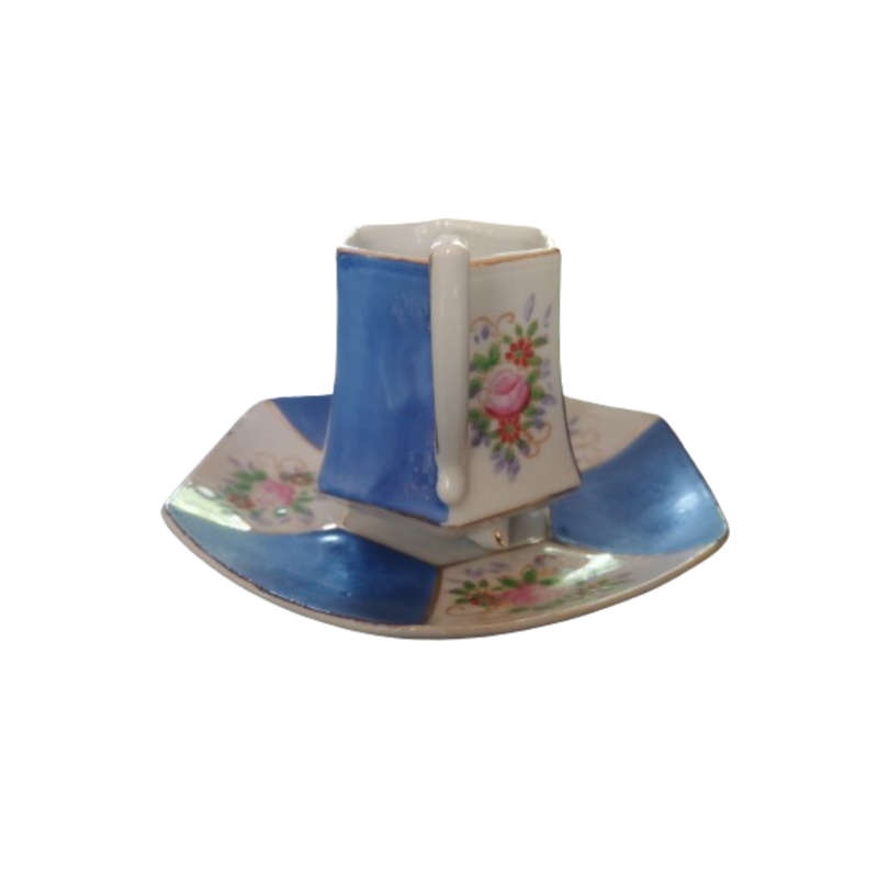 Vintage Japanese  hand painted miniature tea cup and saucer set