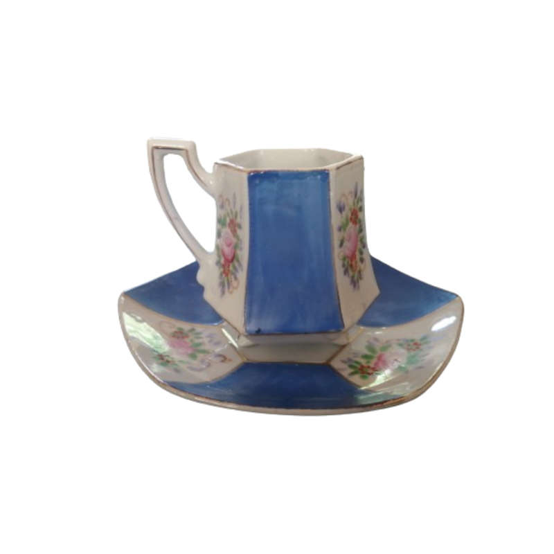 Vintage Japanese  hand painted miniature tea cup and saucer set