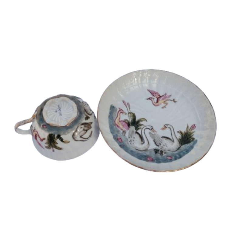 Dresden exquisite set features a pair of courting swans