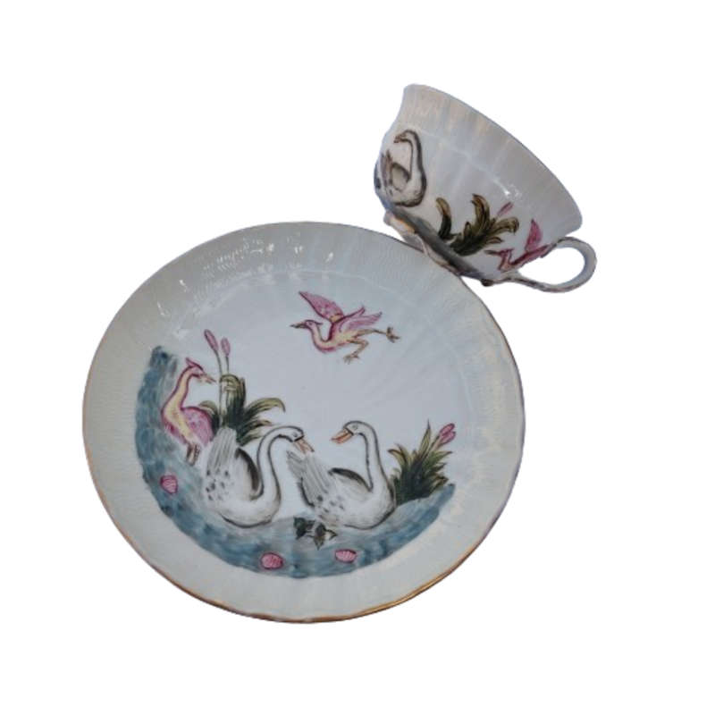 Dresden exquisite set features a pair of courting swans