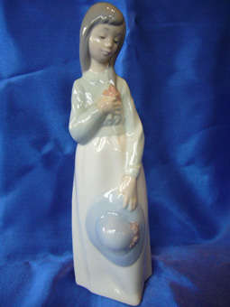A NAO Spanish porcelain Figure 1990- Girl with Hat