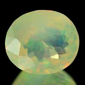 GORGEOUS 0.81 CT NATURAL ETHIOPIAN MULTI-COLOUR FACETED OPAL!