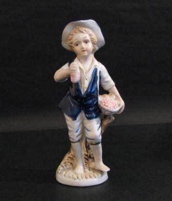 Boy With Fruits  Pocelain Figurine
