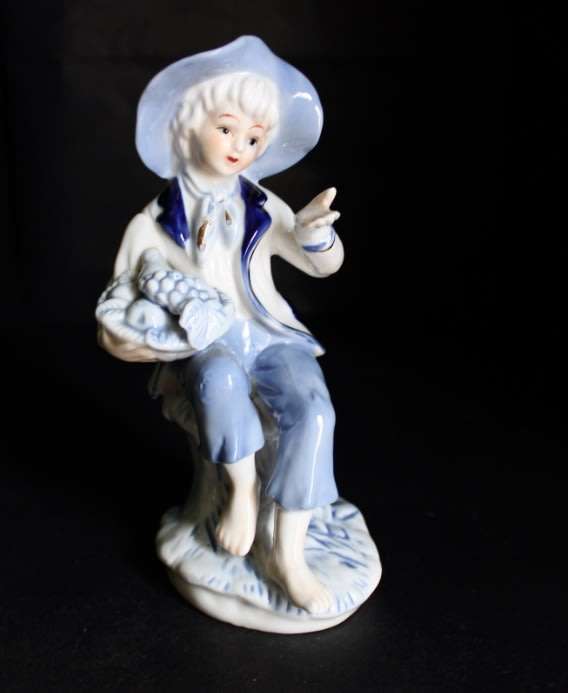 Little Boy Blue with Fruit Basket Porcelain Figurine