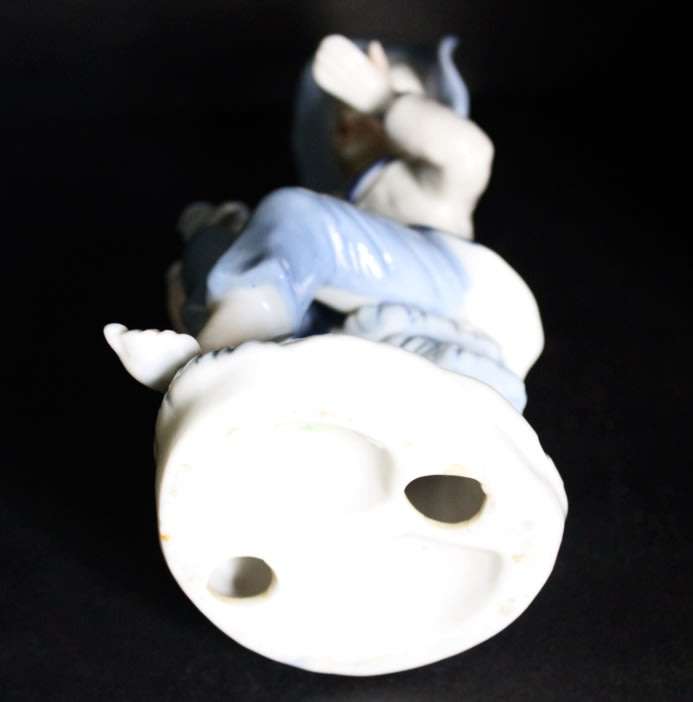 Little Boy Blue with Fruit Basket Porcelain Figurine